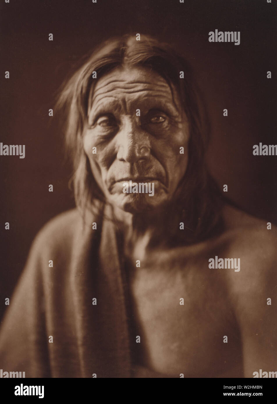 Edward S. Curtis Indios Nativos Americanos - Cabeza Grande, cabeza y hombros retrato ca. 1905 Foto de stock