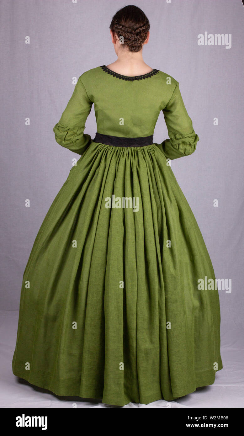 Mujer victoriana en ensemble verde Foto de stock