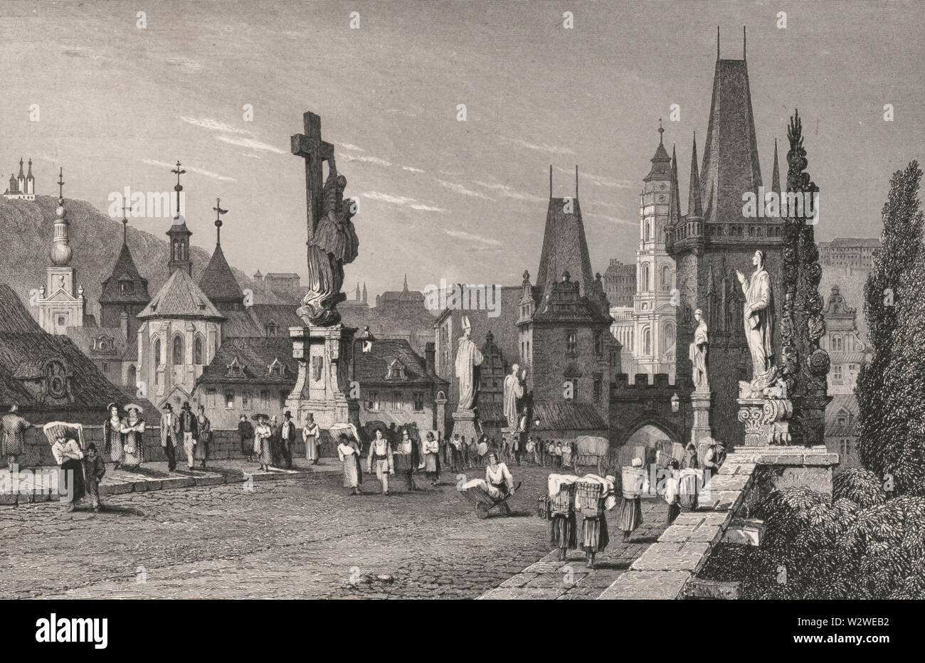 Praga - Imprimir muestra una vista del Puente de Carlos en Praga, República Checa, con torres en el extremo de la derecha, la estatua de Lutgardis sobre la izquierda, y los peatones en el puente, con paisaje urbano de Praga en el fondo. 1831 Foto de stock