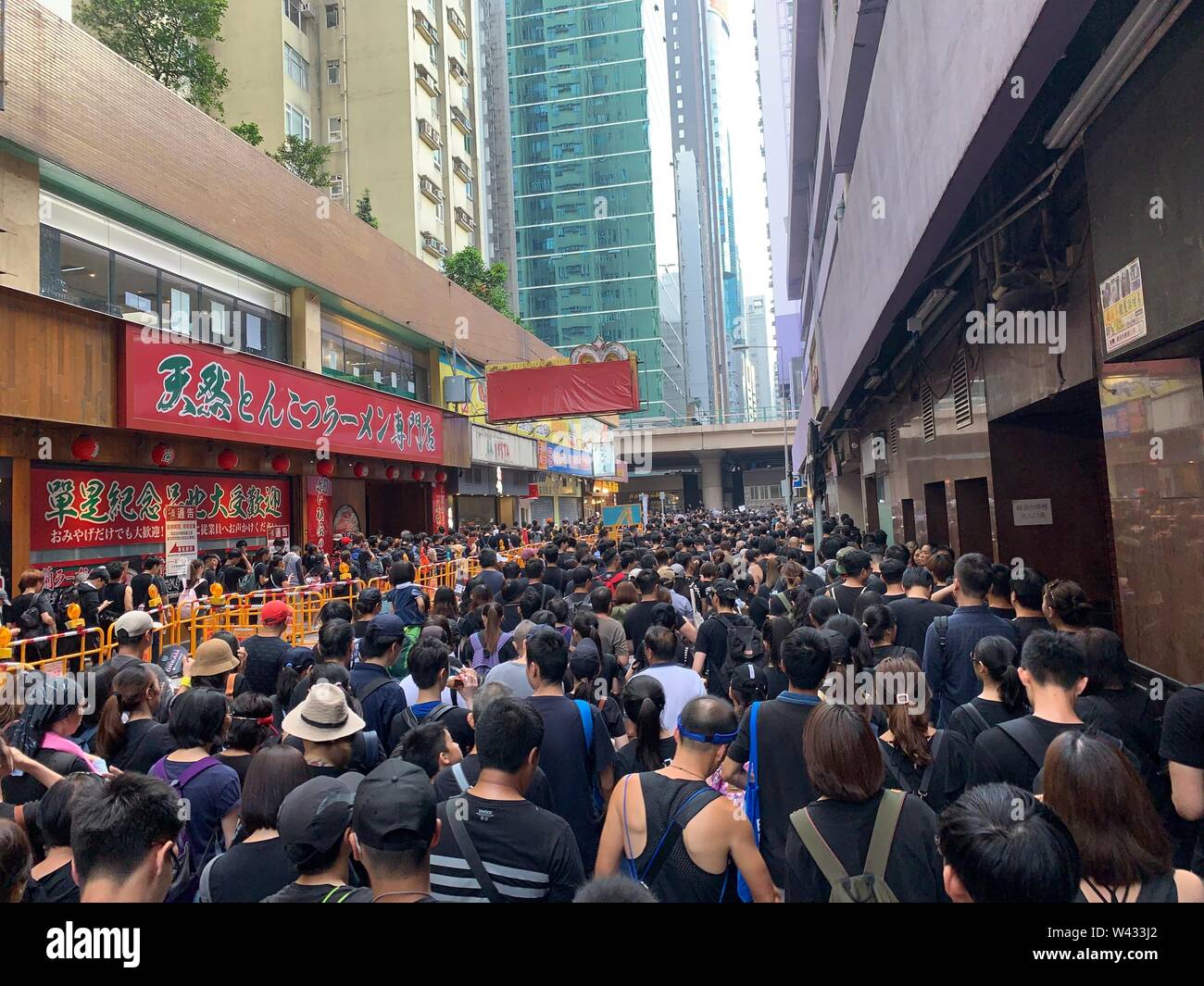 Hong Kong - 16 Junio 2019: 2 millones de manifestantes se destacan a oponerse a un polémico proyecto de ley de extradición que puede incluir china. Desde el 09 de junio, el pueblo de Hong Kong mantenga a la protesta contra la ley de extradición. Foto de stock