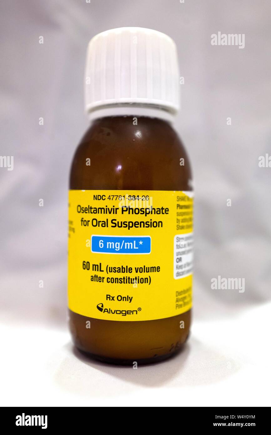 Cierre de botella de fosfato para suspensión oral de oseltamivir, comercializado bajo la marca Tamiflu y utilizados para tratar el virus de la gripe en los niños, 21 de marzo de 2019. () Foto de stock