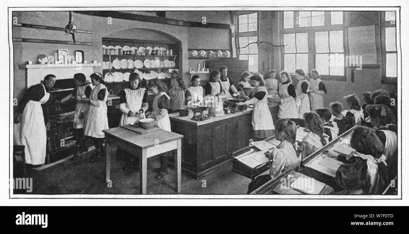 Aprender a cocinar, Londres, c1900 (1901). Artista: Desconocido. Foto de stock