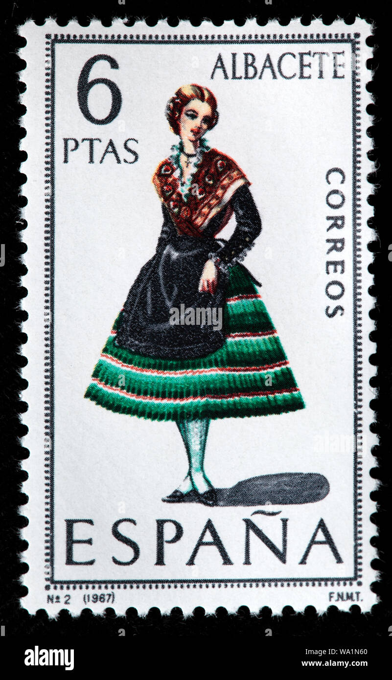 Albacete, Castilla-La Mancha, mujer de moda tradicional traje regional,  sello, España, 1967 Fotografía de stock - Alamy