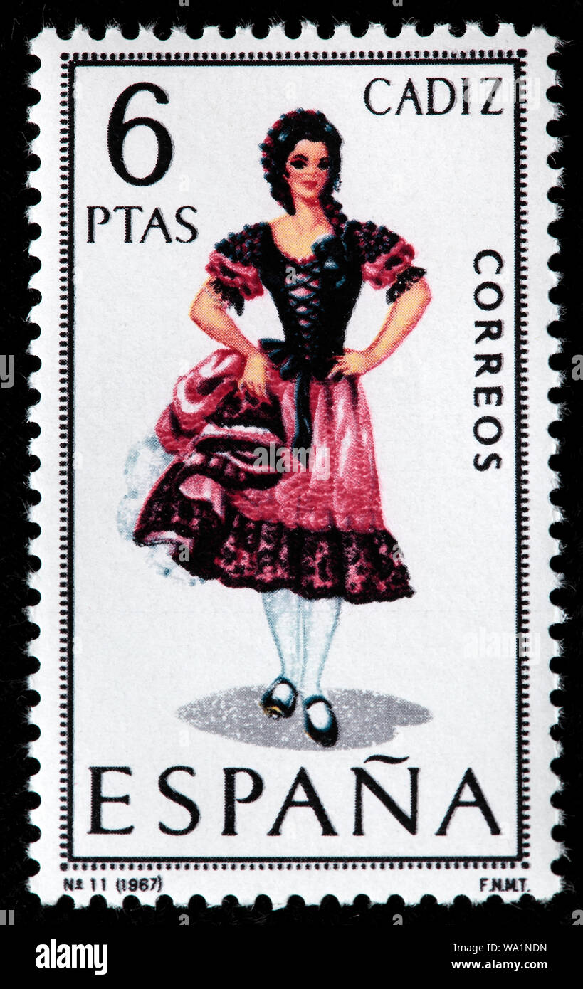 Cádiz, Andalucía, mujer de moda tradicional traje regional, sello, España,  1967 Fotografía de stock - Alamy