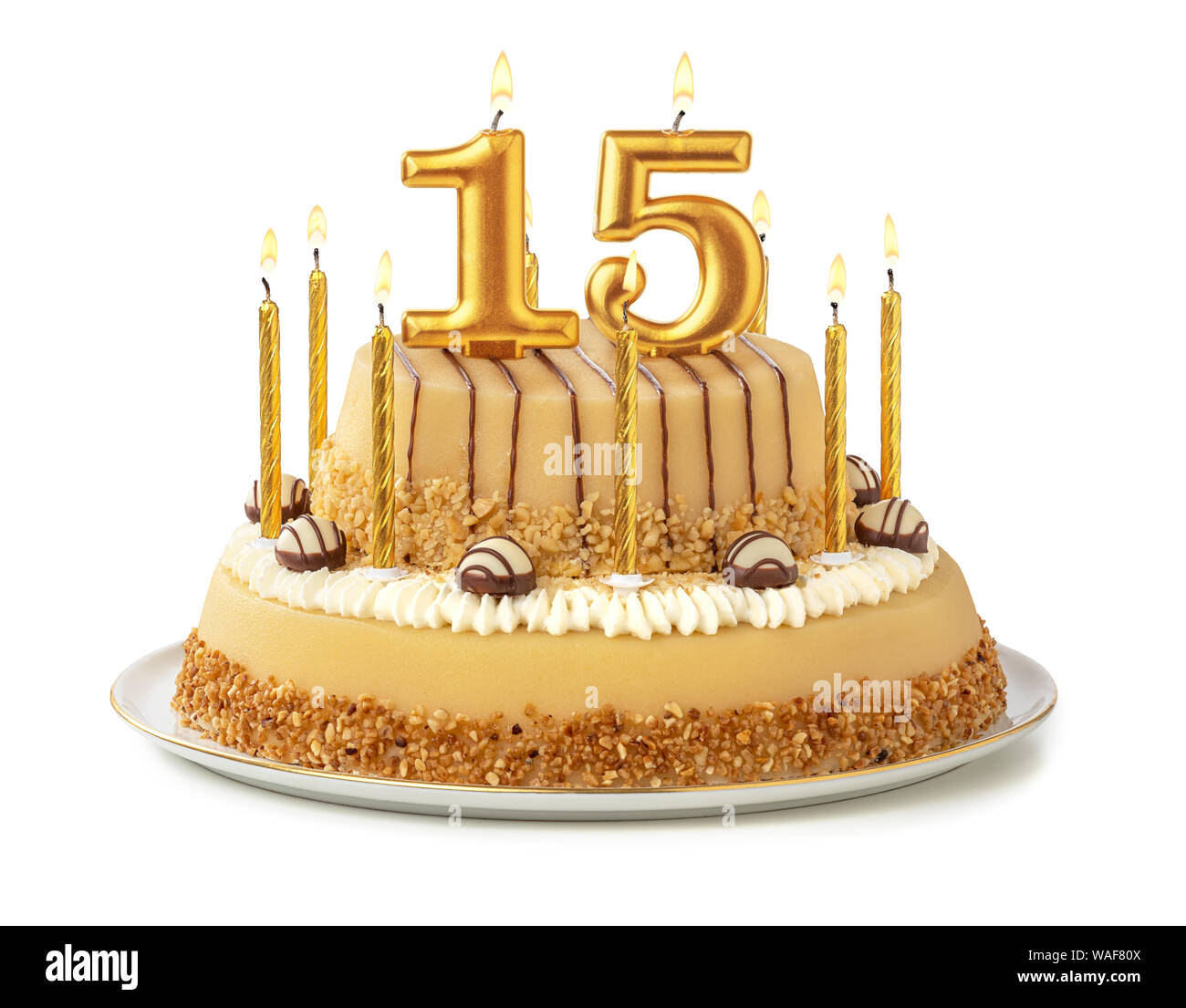 Torta Festiva con velas de oro - número 15 Fotografía de stock - Alamy