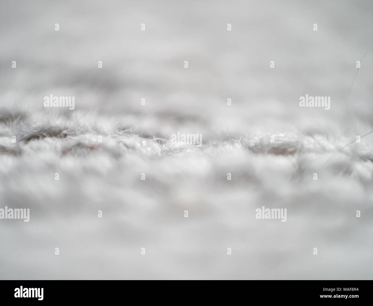 Detalle de textura rugosa de alfombra de tejido firme en blanco natural  Fotografía de stock - Alamy