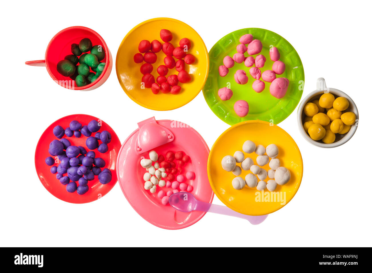 Alimentos de juguete de plastilina Jelly Beans aislado en blanco Foto de stock