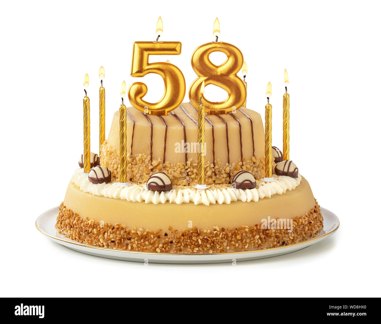 Torta Festiva con velas de oro - número 58 Fotografía de stock - Alamy