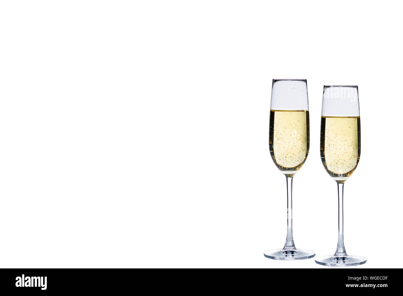 Close-up de Champagne contra el fondo blanco. Foto de stock
