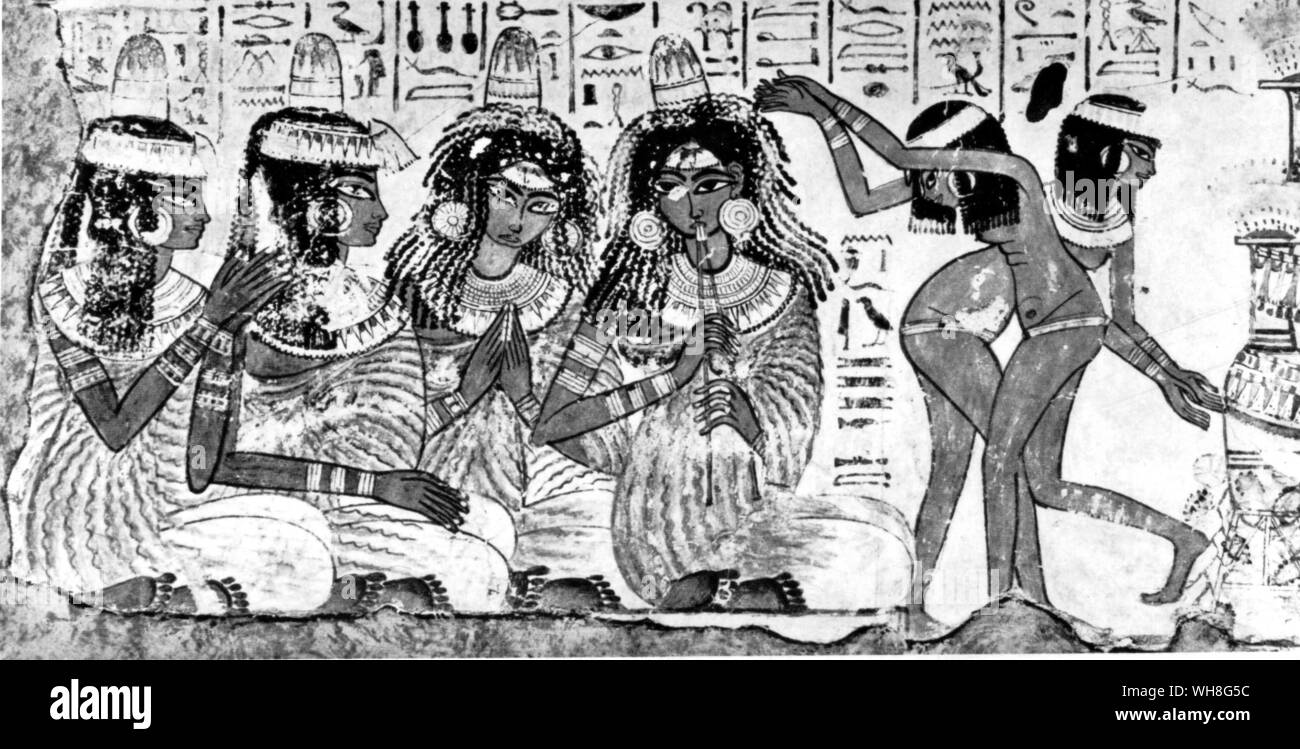 Pintado de alivio. Cante y Baile: Una escena de las paredes de una capilla tebano. Tutankamón por Christiane Desroches Noblecourt, página 45. Foto de stock