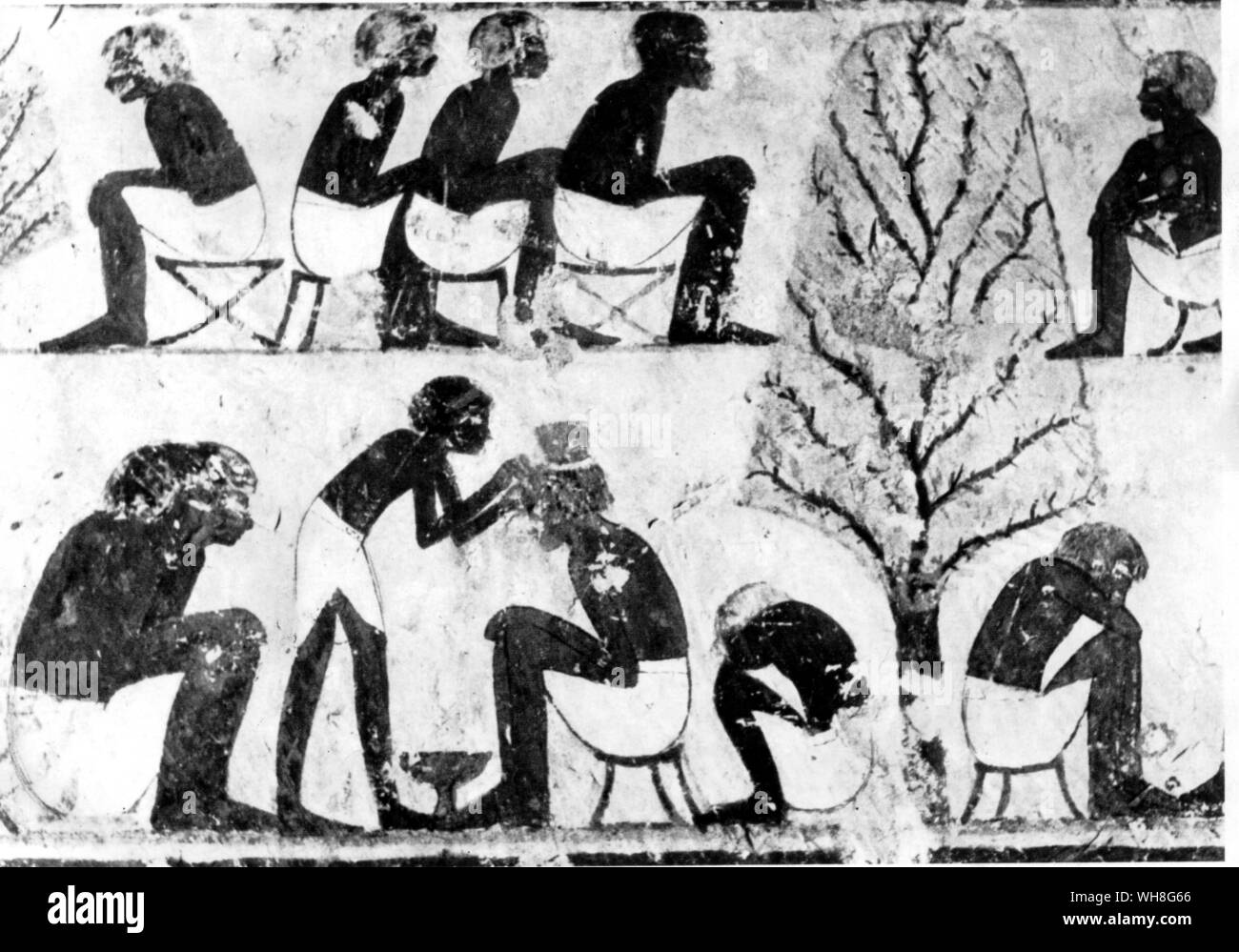 Pintado de alivio. Un peluquero trabajando en los campos. Escena en la capilla de Woserhet Tebano. Tutankamón por Christiane Desroches Noblecourt, página 45. Foto de stock