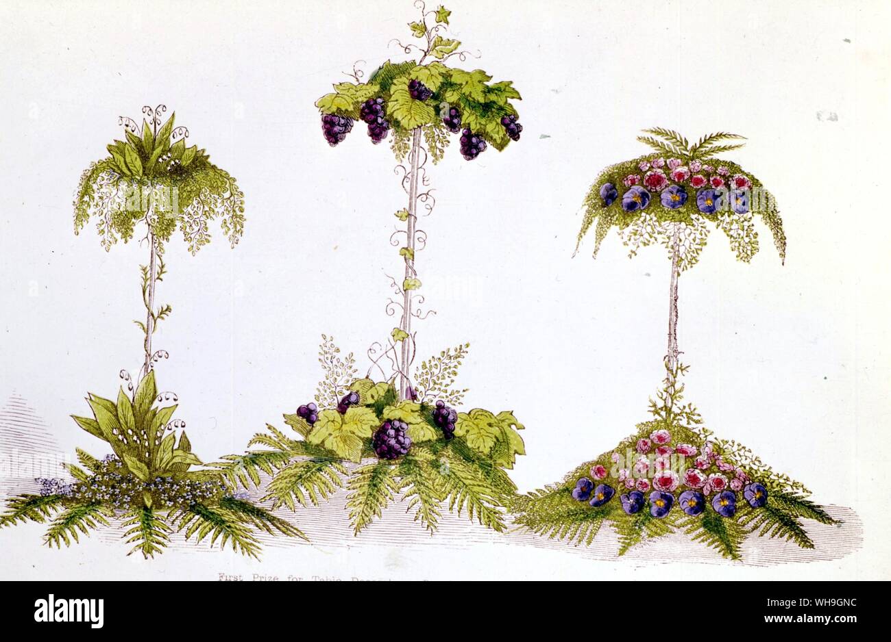 Acuerdo epergnes victoriano en frutas y flores. Foto de stock