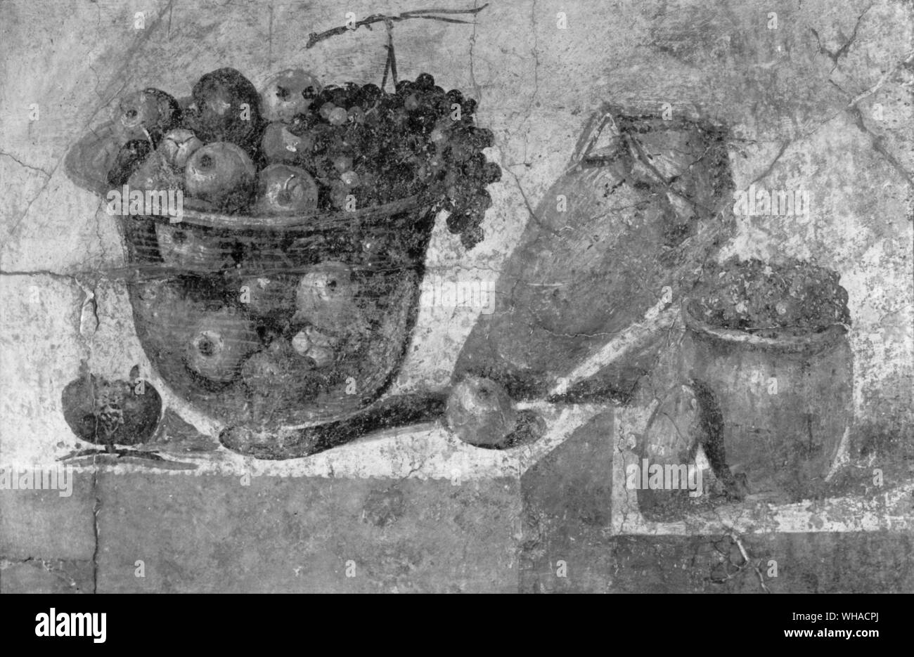 Muralla romana de pintar de frutas y vasos. Foto de stock