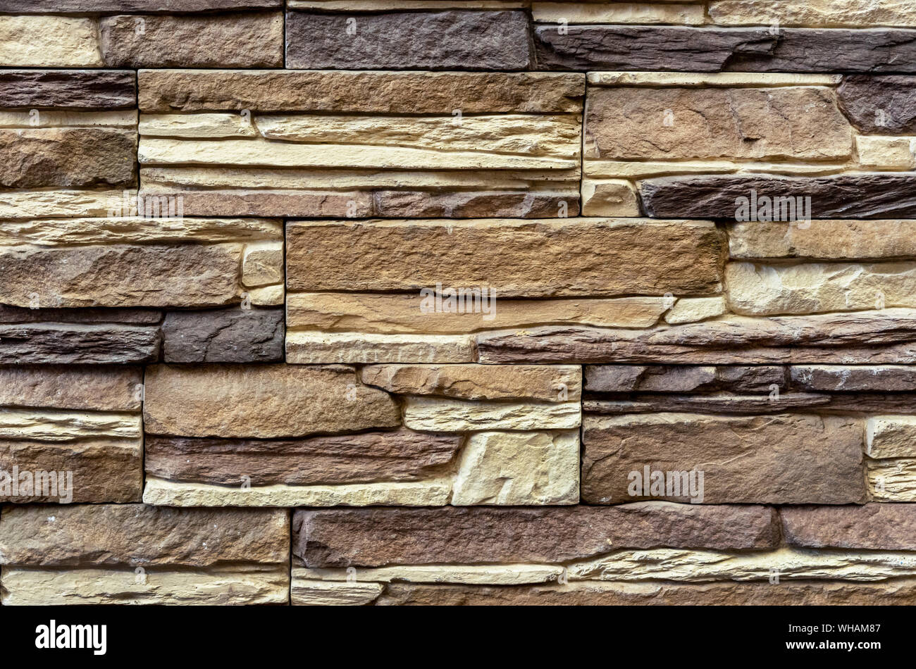 La textura de la pared de piedra. Grupo de piedras para el acabado de la  fachada del edificio y el diseño interior de la casa. Para el diseño de  fondo y decora
