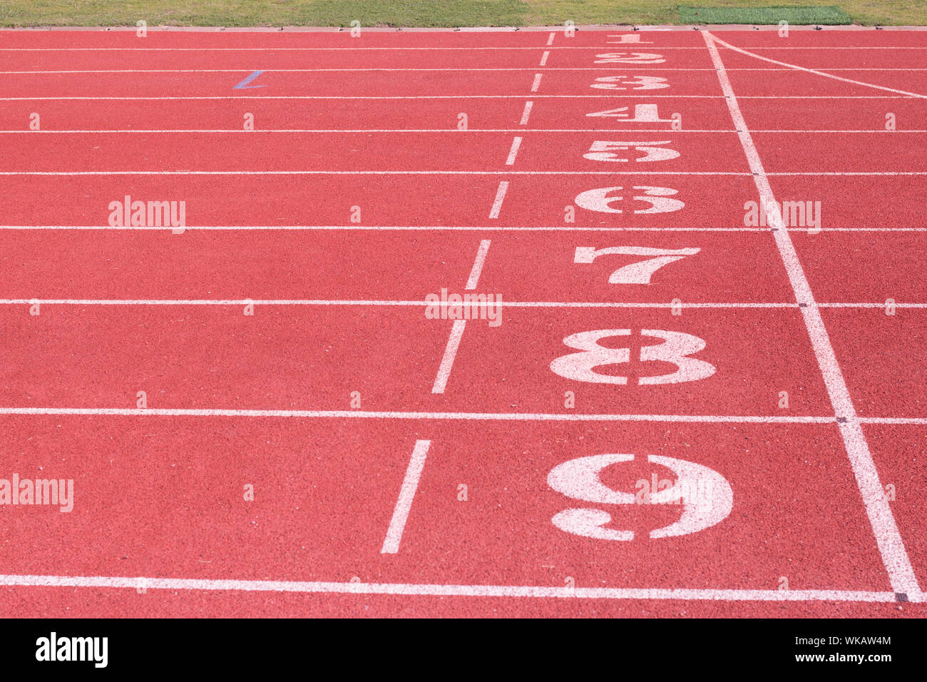 Los números de pista de atletismo en el estadio Fotografía de stock Alamy