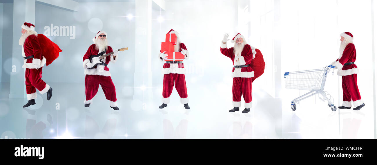 Imagen compuesta de diferentes santas contra luces brillando en habitación moderna Foto de stock