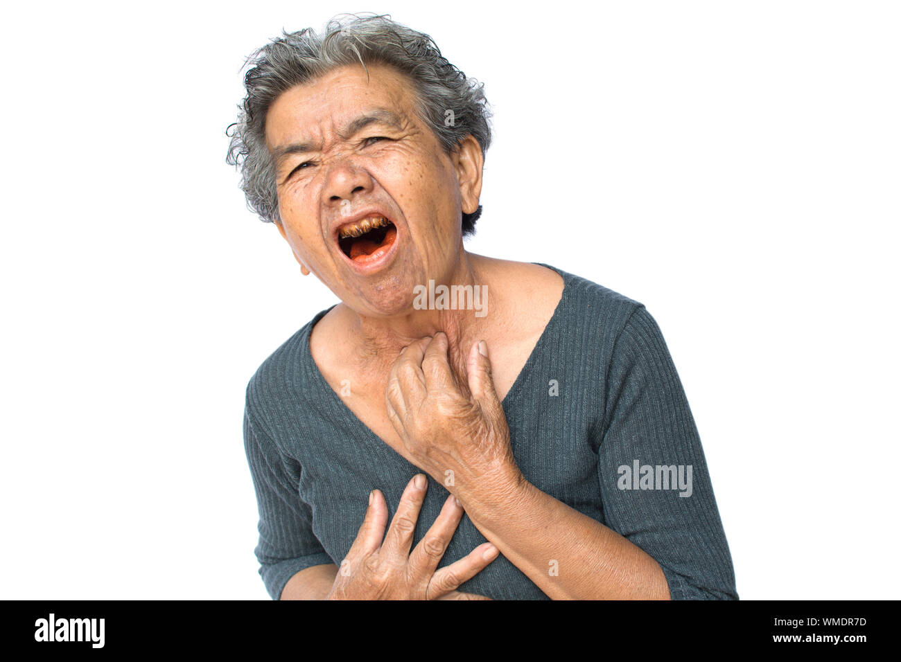 Mujer de más edad con dolor contra el fondo blanco. Foto de stock