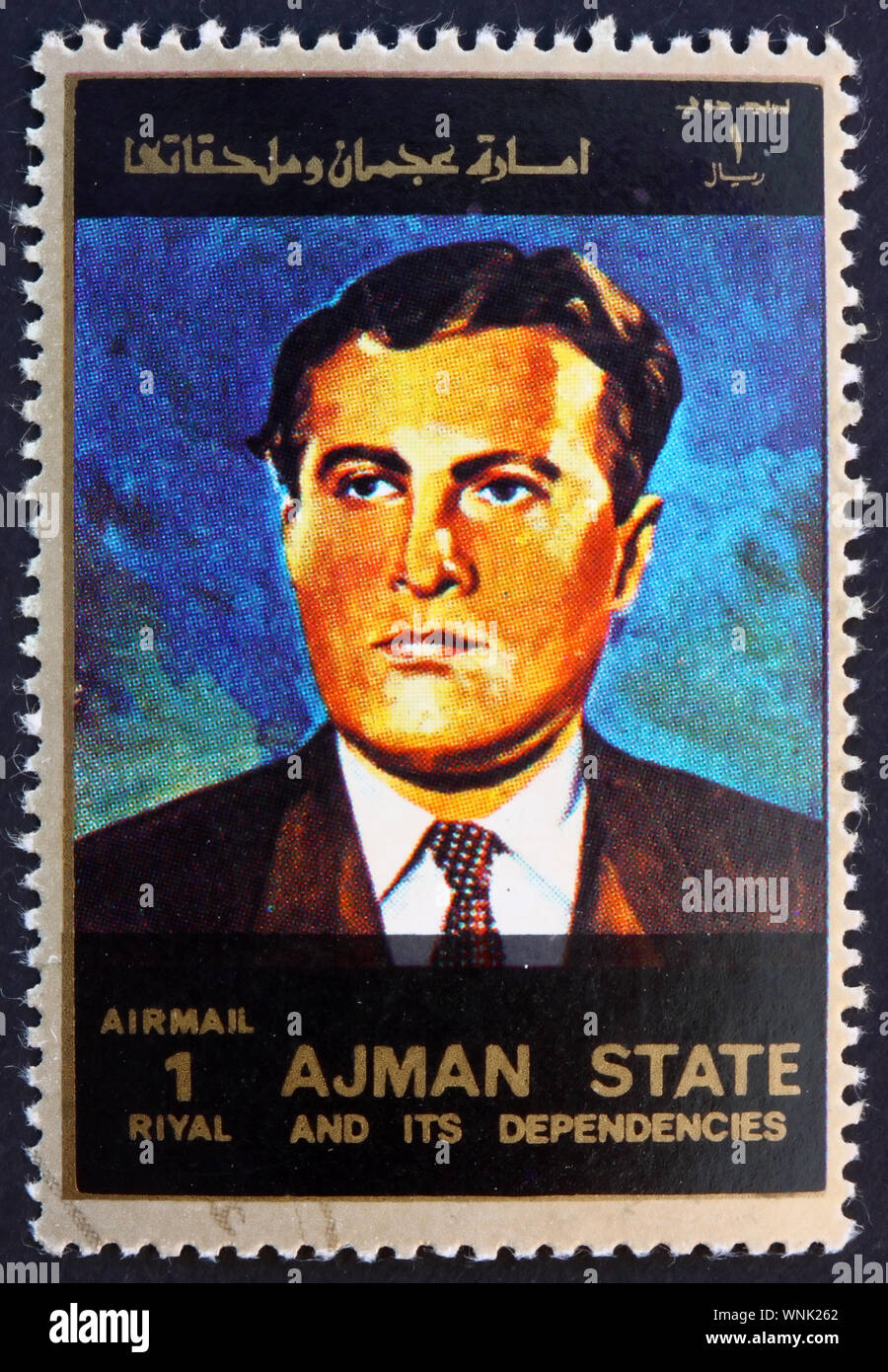 AJMAN - circa 1973: un sello impreso en el Ajman muestra Wernher von Braun, científico, ingeniero aeronáutico y arquitecto espacial, circa 1973 Foto de stock