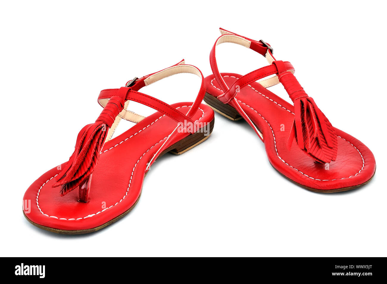 La mujer sandalias de color rojo con fondo blanco Fotografía de stock -  Alamy