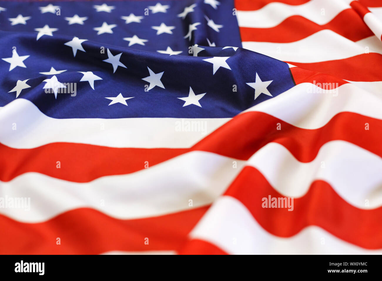 La bandera de Estados Unidos, símbolo nacional, el día de la independencia. patriótica, saludando con la mano, cerrar Foto de stock