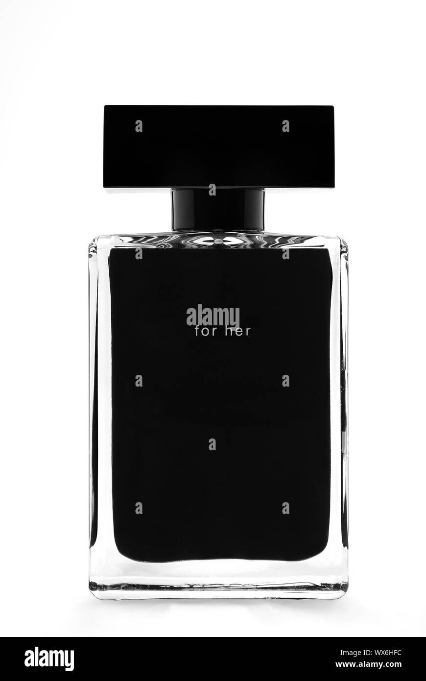 Frasco de perfume cosmético en blanco sobre el fondo blanco. Foto de stock