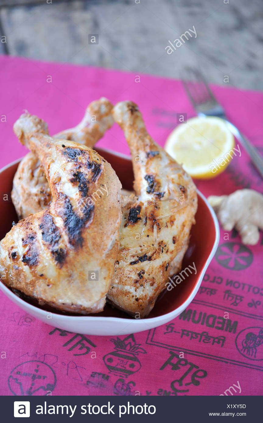 Piernas de pollo estilo Tandoori en Foto de stock
