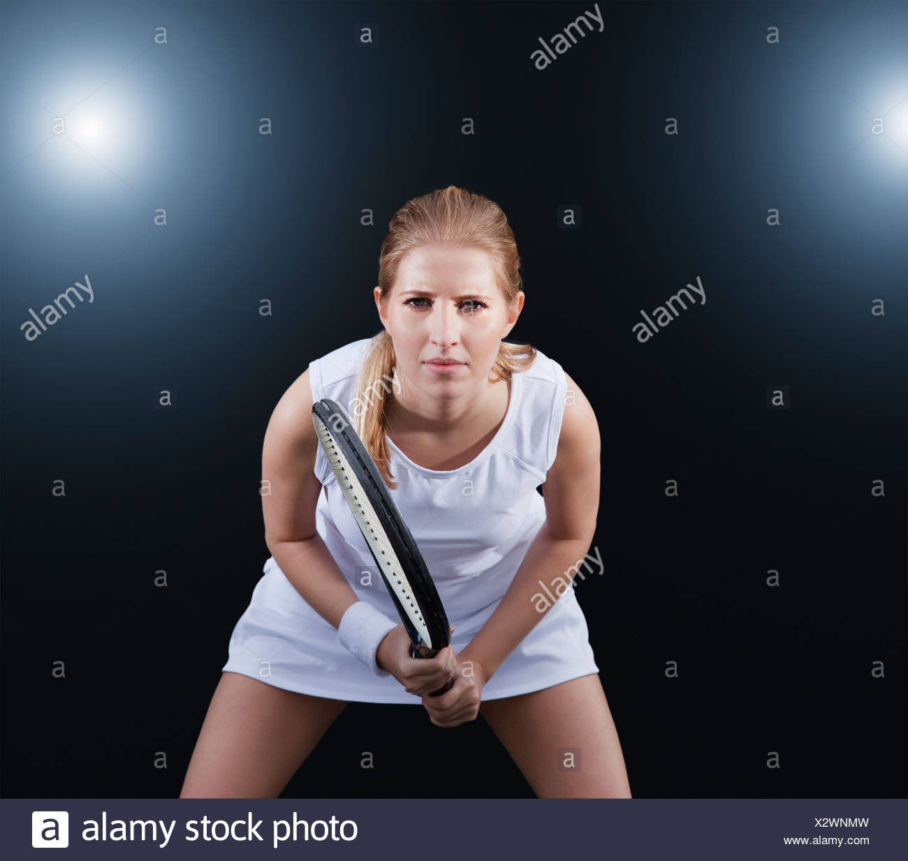 Jugador de tenis preparada en el juego Foto de stock