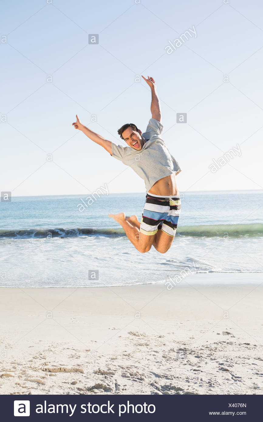 Energetic guapo saltar Foto de stock