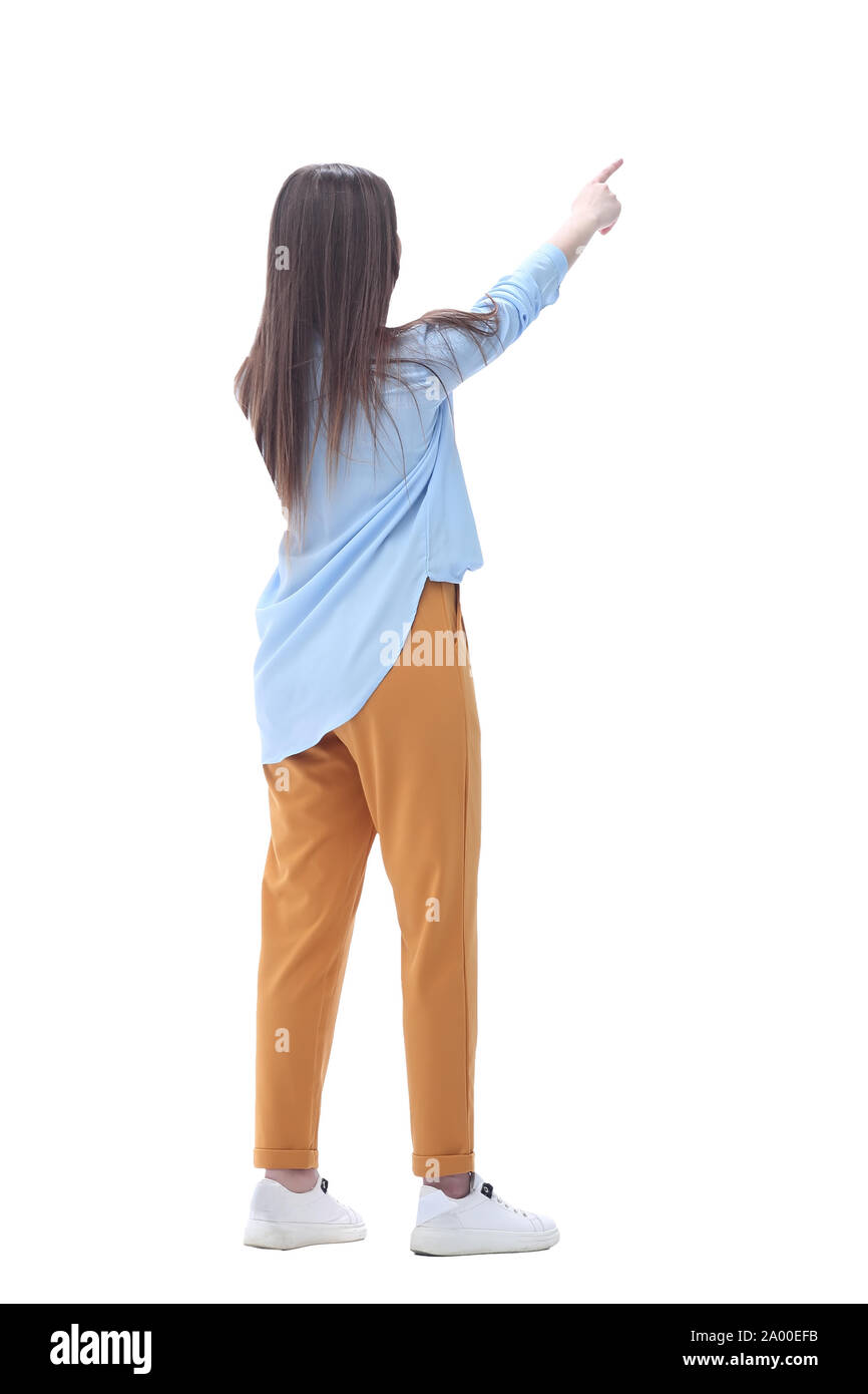 Jeune femme pointant sur écran blanc .isolated on white Banque D'Images