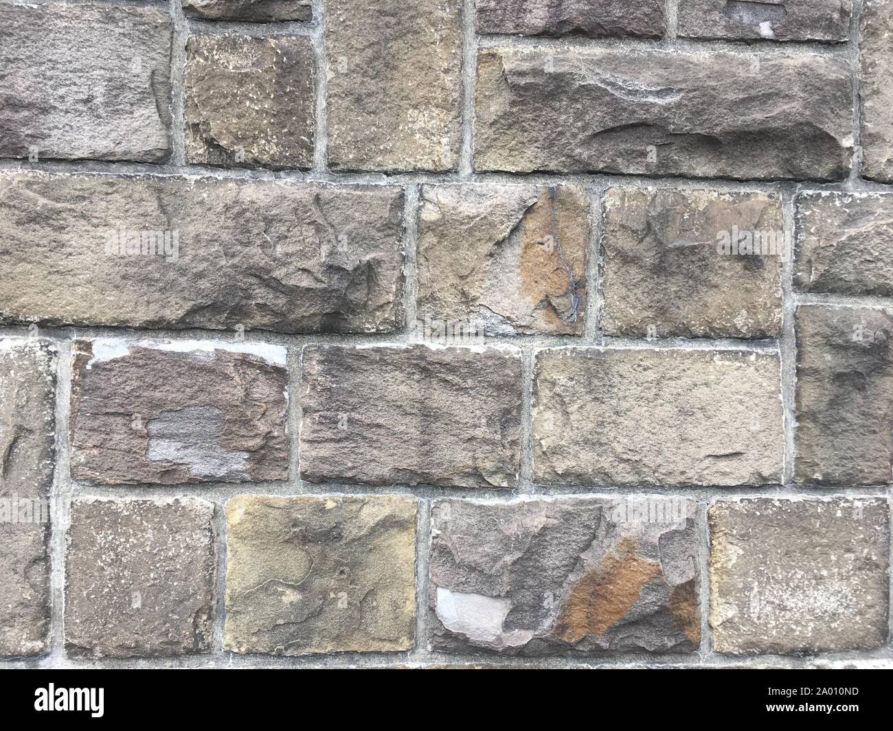 La texture du mur en pierre avec de grandes briques sur l'ancienne muraille de la ville historique en Allemagne, l'Europe. Peut être utilisé comme une texture ou un arrière-plan. Banque D'Images