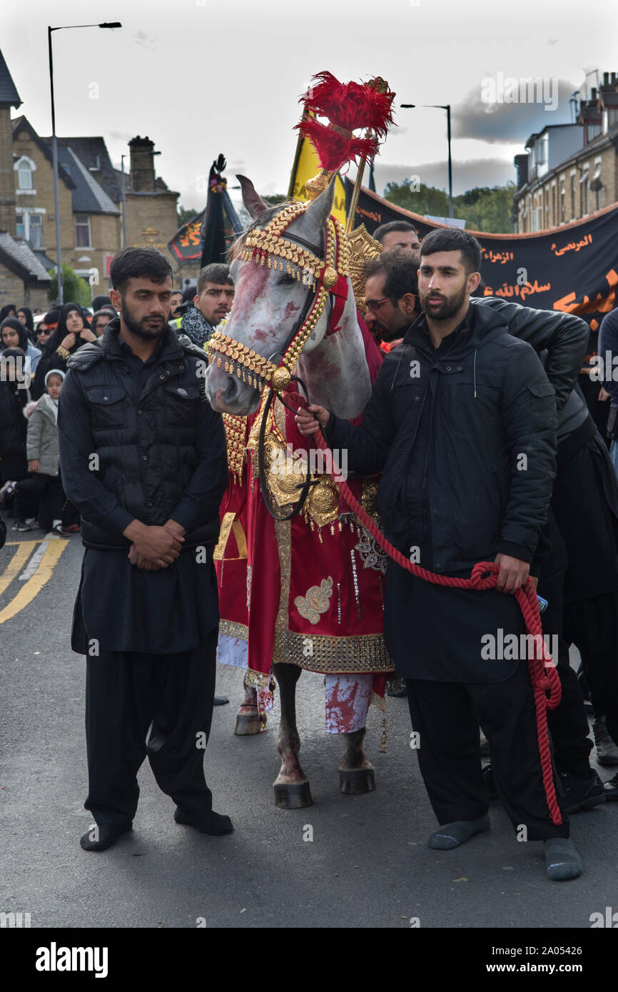 Communauté musulmane Bradford 2019 2010S UK. Jour de l'Ashoura parade les musulmans chiites se rappeler le martyre de Hussein Husayn ibn Ali dans la bataille de Karbala HOMER SYKES Banque D'Images