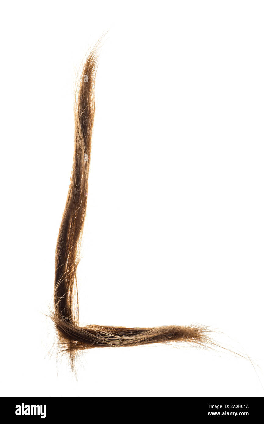 Lettres fabriqués à partir de cheveux femme capital L isolé sur fond blanc. Banque D'Images