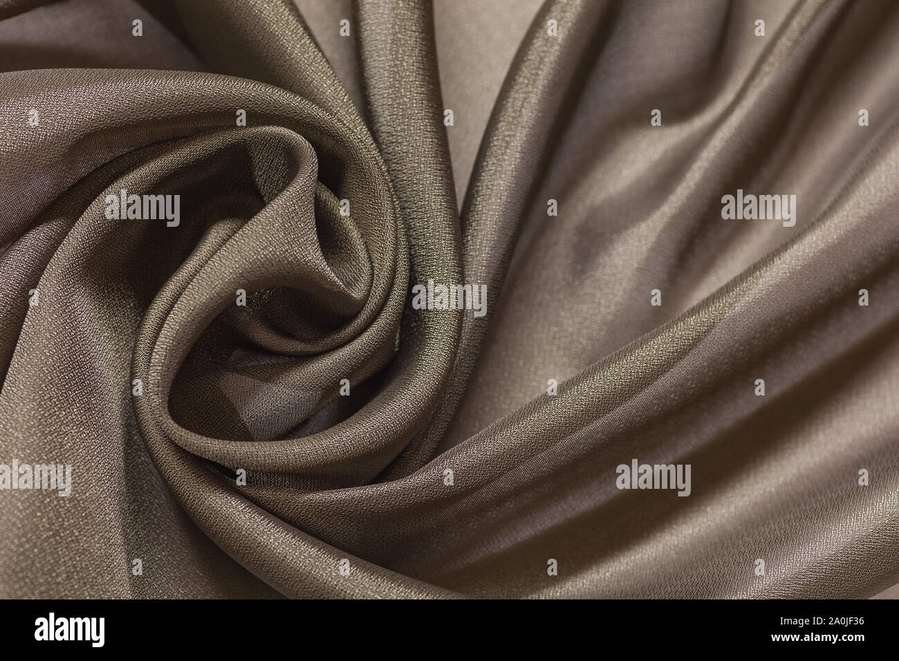 Tissu brillant avec fond beige textile vail Banque D'Images
