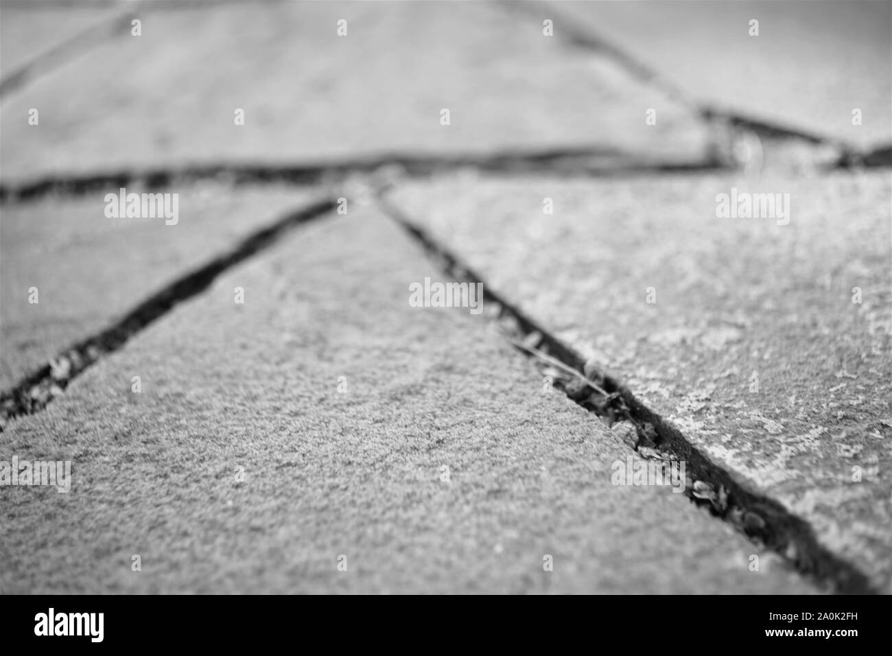 La surface de la route de naturel pierre sauvage libre, photo en noir et blanc Banque D'Images