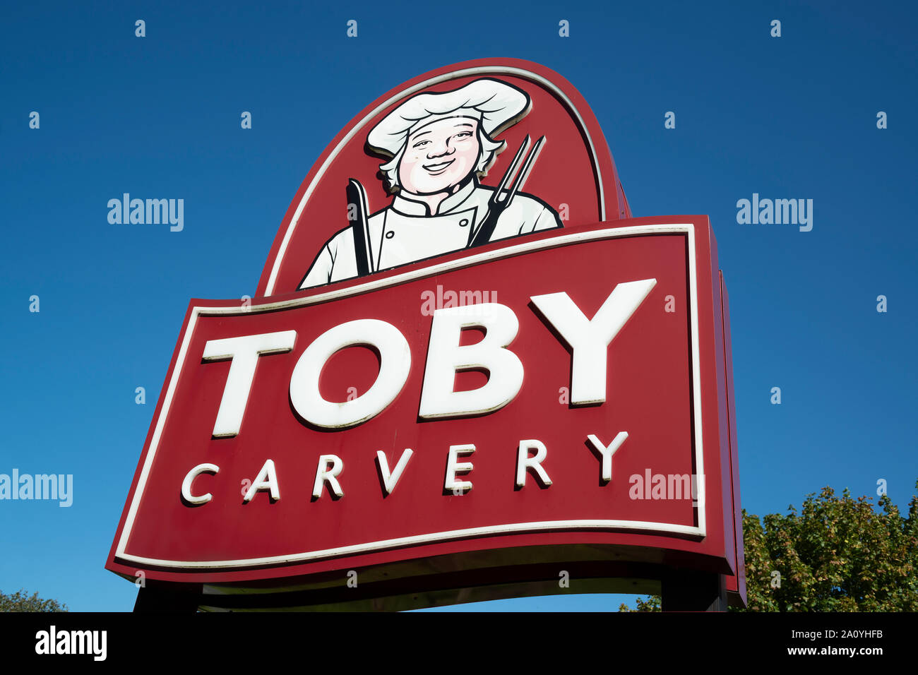 La signalisation d'une succursale de la chaîne de restaurant Toby Carvery. Banque D'Images