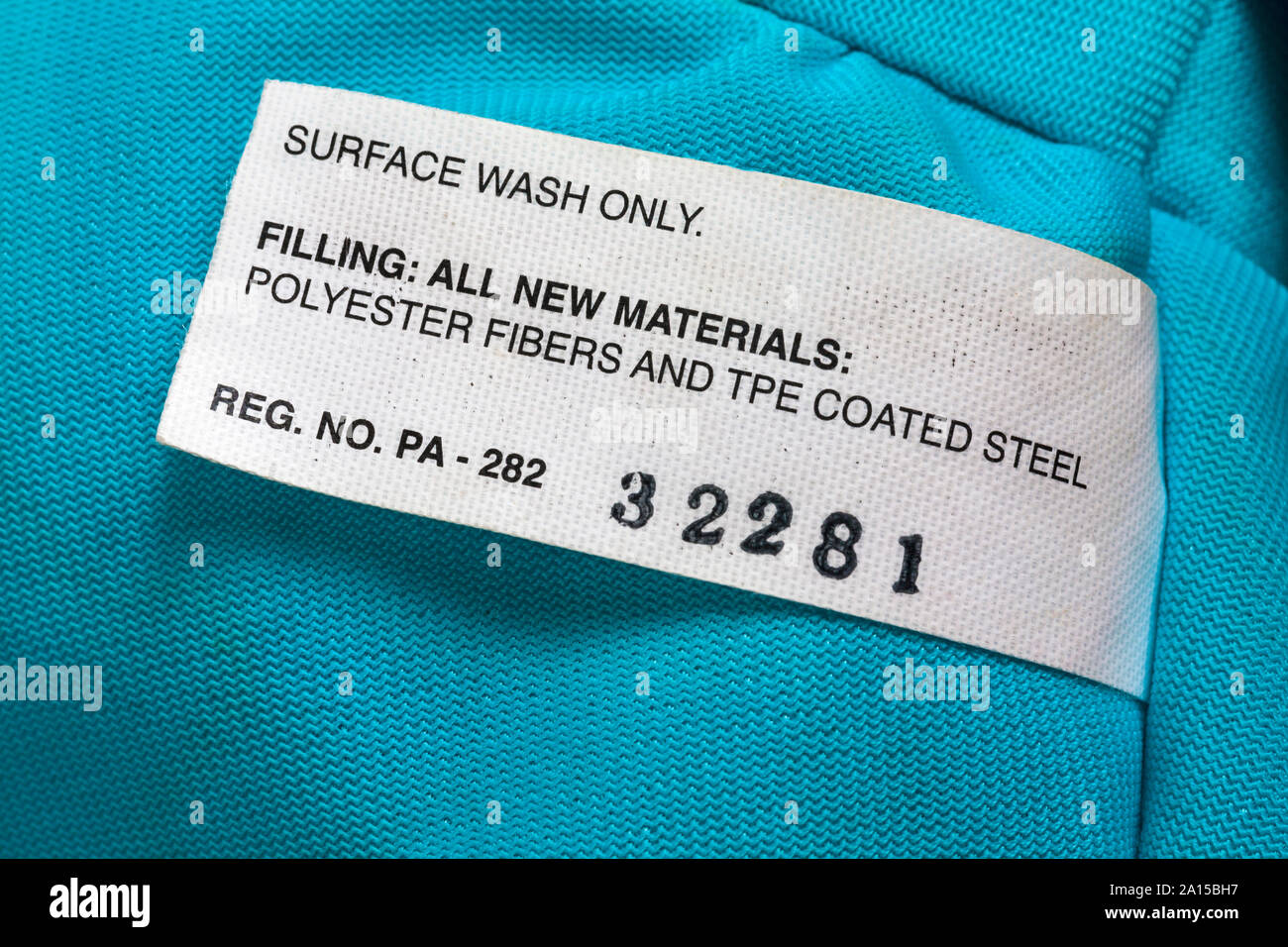 Lavez la surface de remplissage seulement tous les nouveaux matériaux et fibres de polyester laqué de tpe - étiquette sur soft toy Banque D'Images