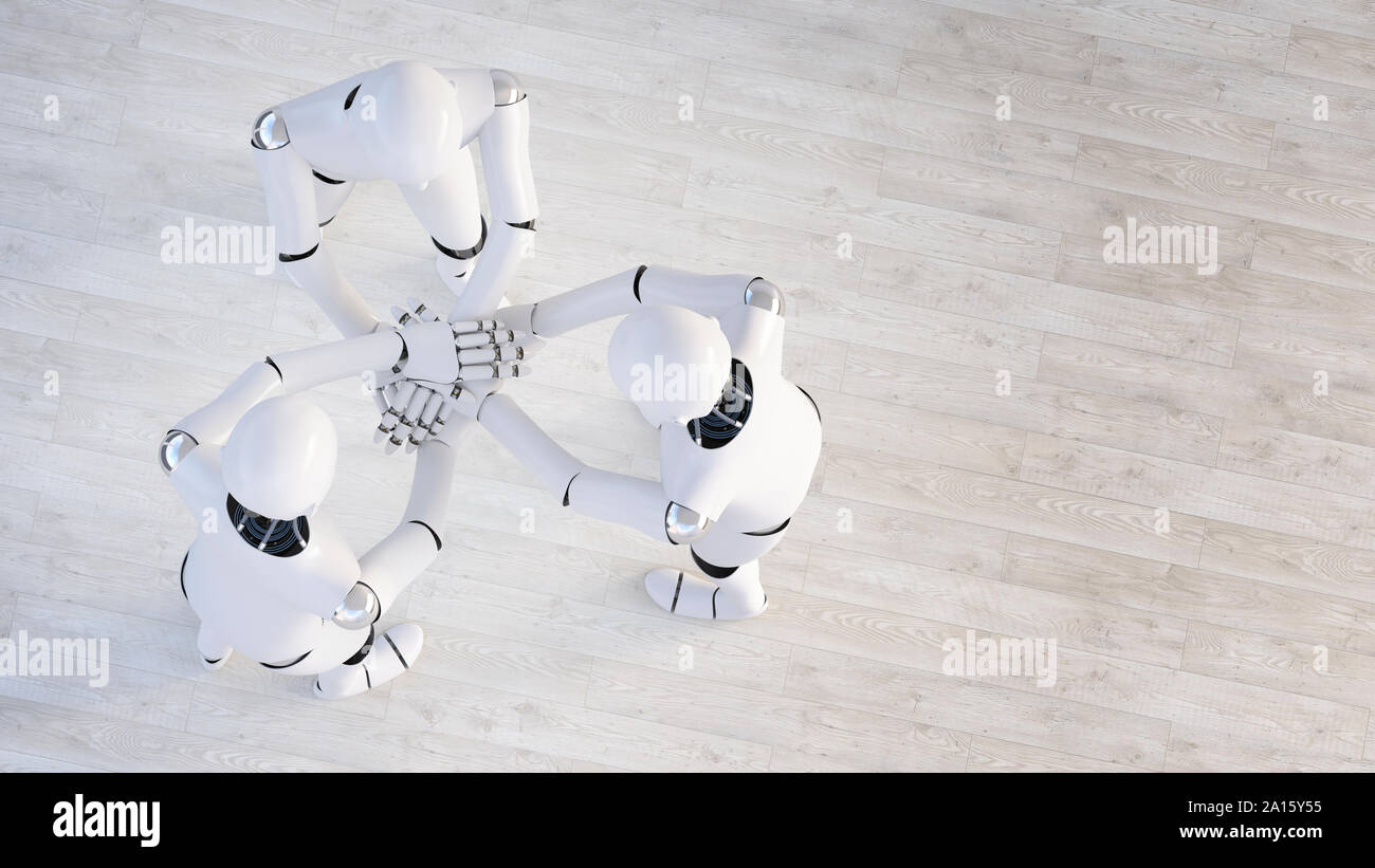 Le rendu de trois robots stacking hands Banque D'Images