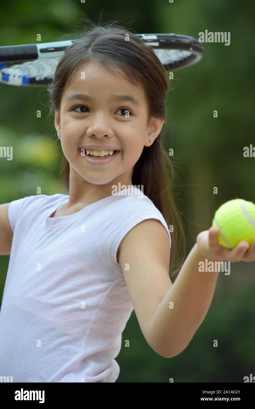 Tennis Player et le bonheur avec raquette de tennis Banque D'Images