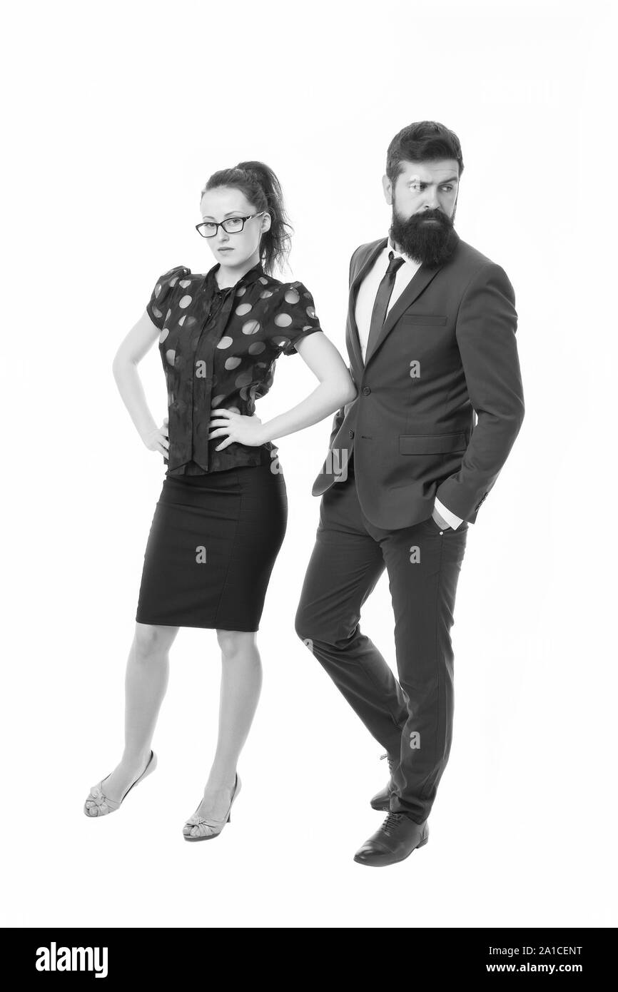 Les gens d'affaires. Patron et dame attrayante sous fond blanc. Les relations d'affaires. Vêtements de mode style formel. Partenaires d'affaires homme avec barbe et femme d'affaires visite conférence ou réunion. Banque D'Images