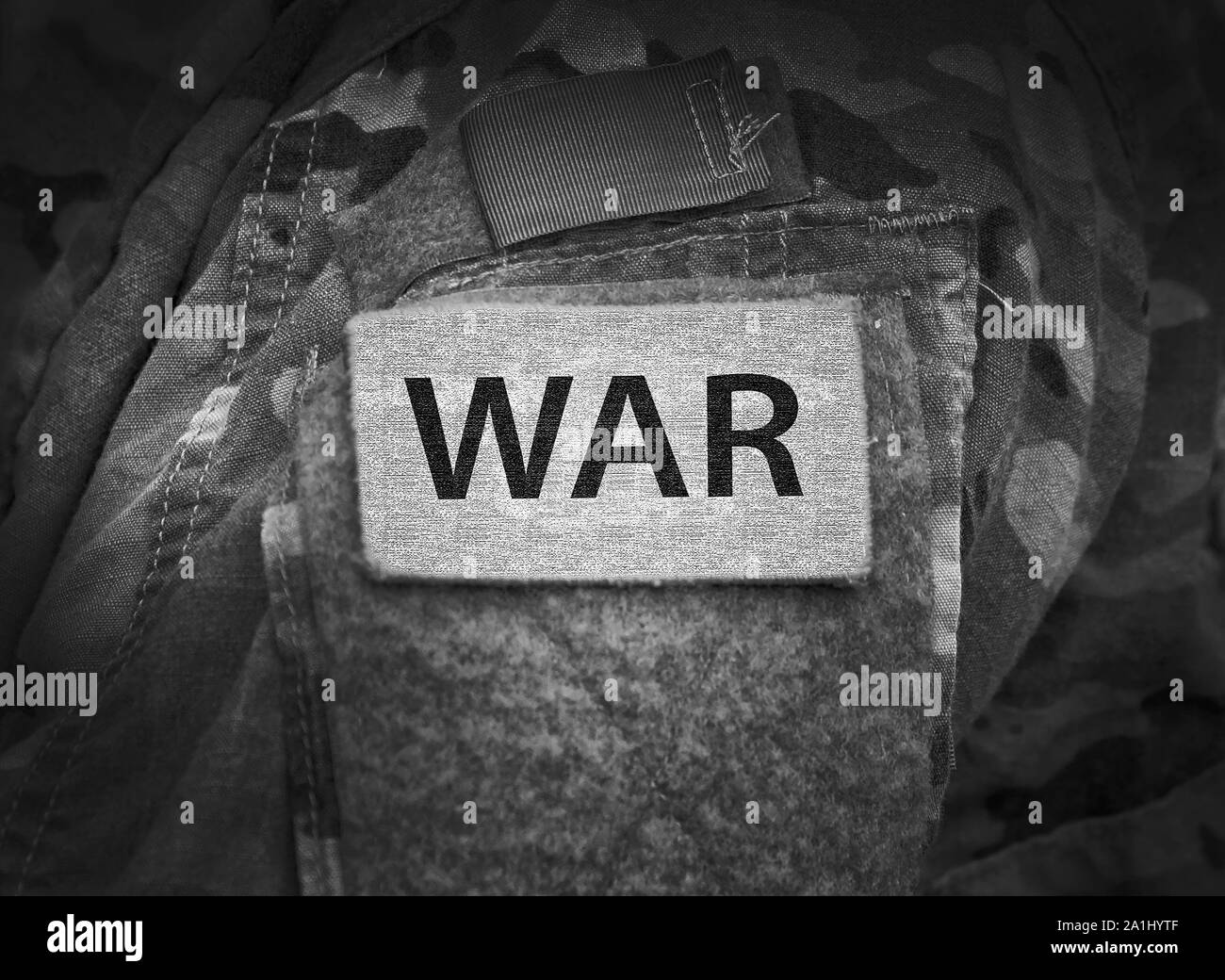 Inscription La guerre à l'uniforme militaire. Concept de guerre. Banque D'Images