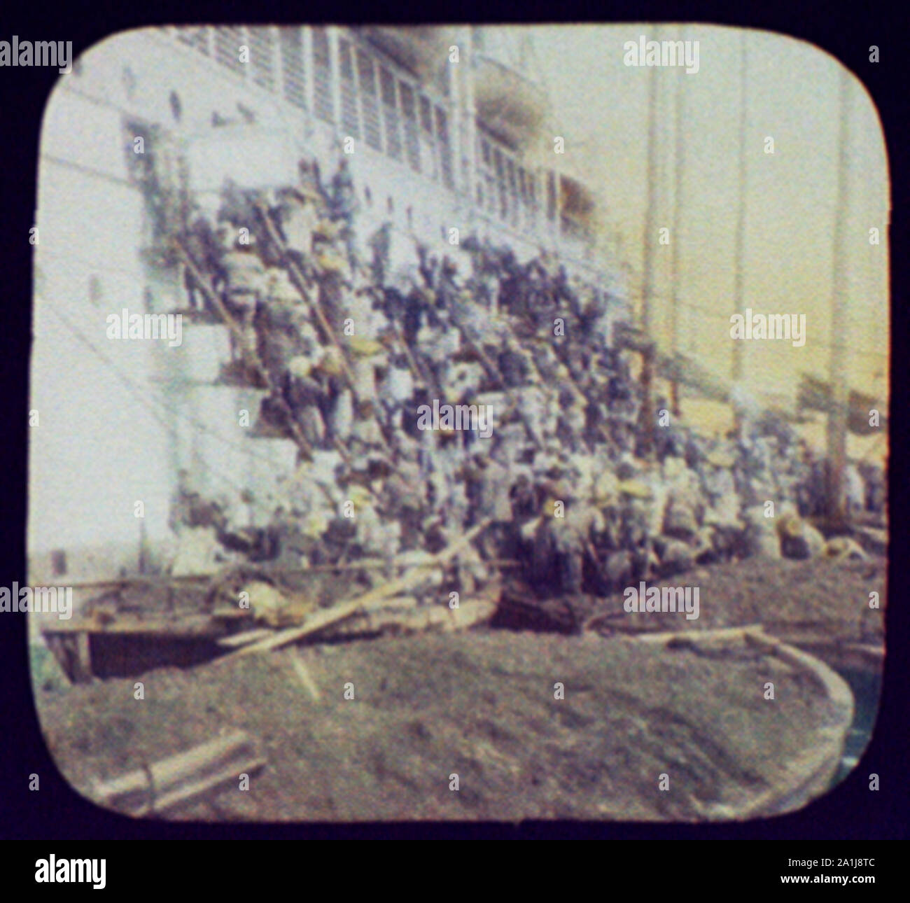 Nagasaki - travailleurs chargement de charbon Banque D'Images