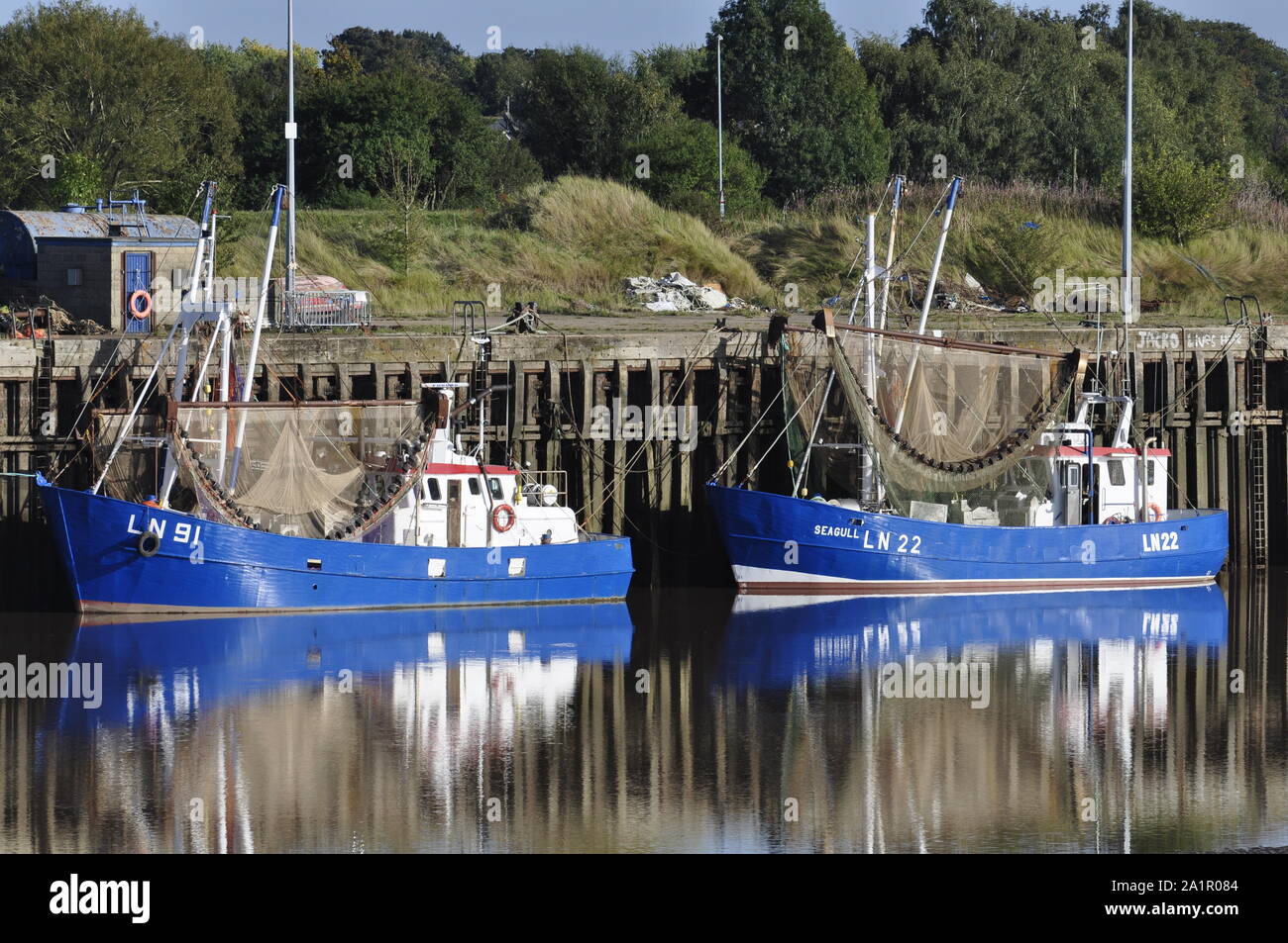 Bateaux de pêche aux crevettes amarré au quai de Boal, King's Lynn, Norfolk UK Banque D'Images