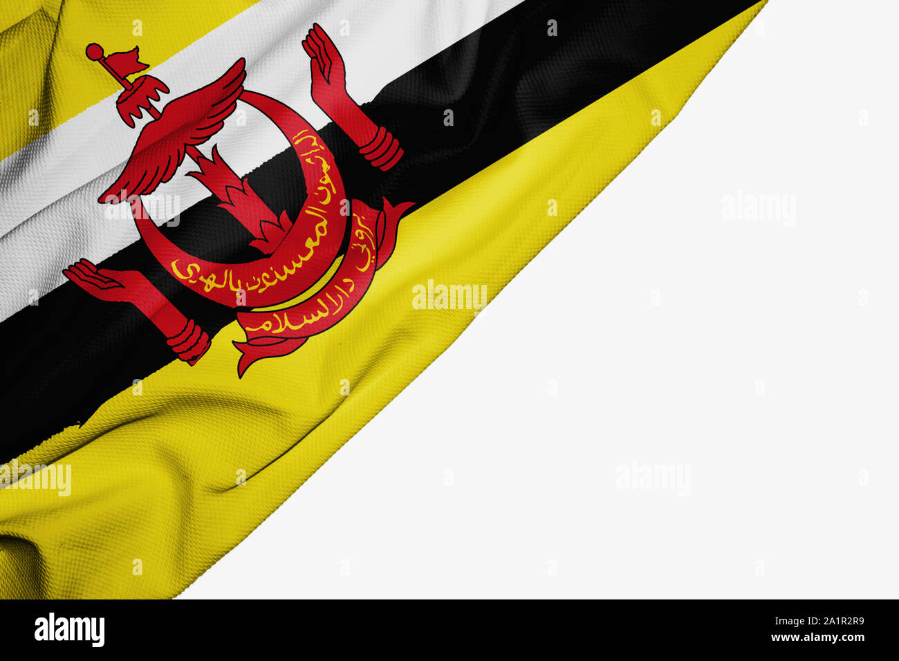 Brunei drapeau de tissu avec copyspace pour votre texte sur fond blanc Banque D'Images