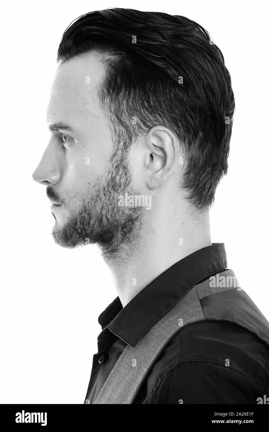 Vue de profil de face of young man wearing vest Banque D'Images