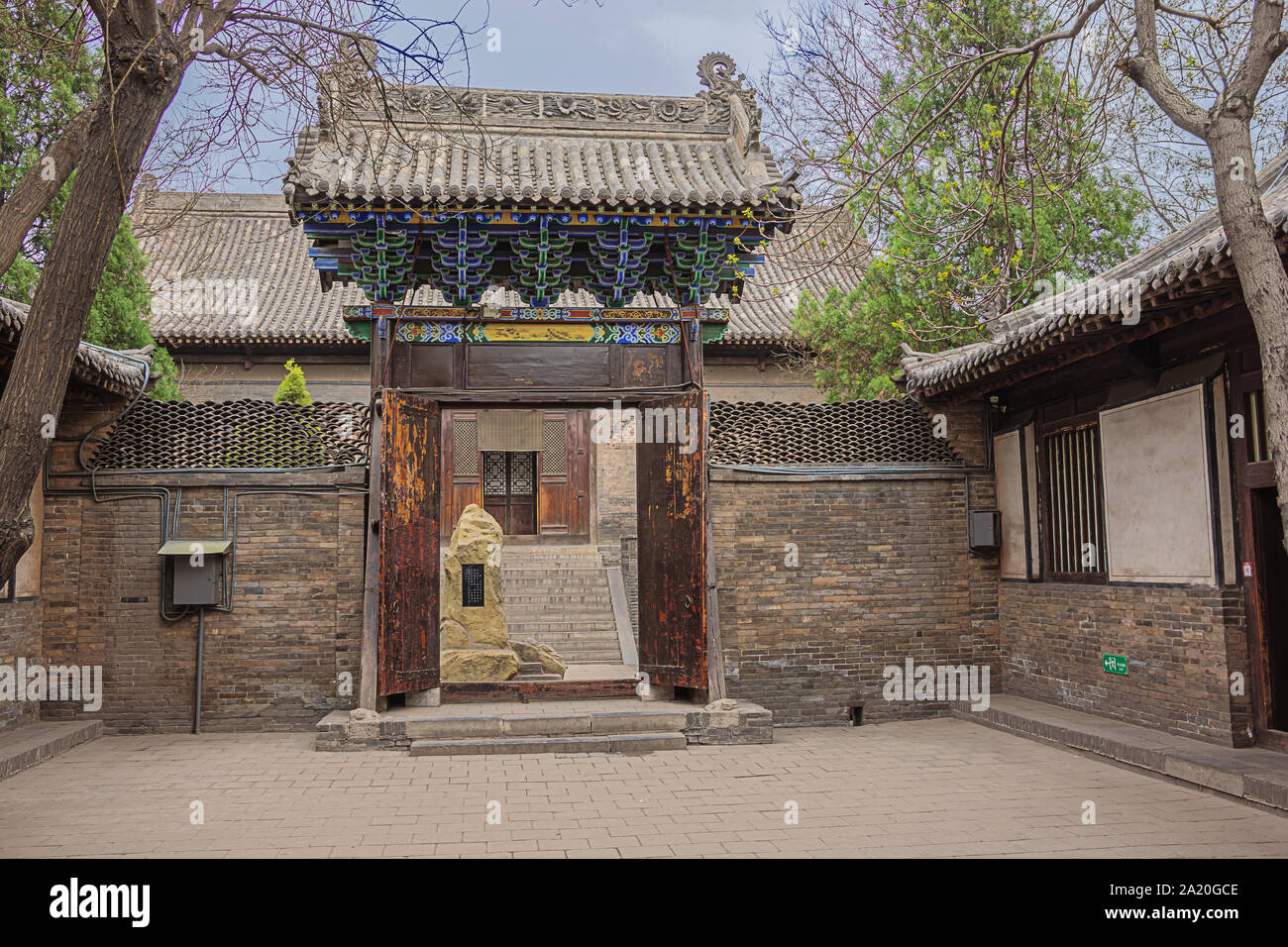 Gate à une cour au temple complexe dans la vieille ville de Pingyao Banque D'Images