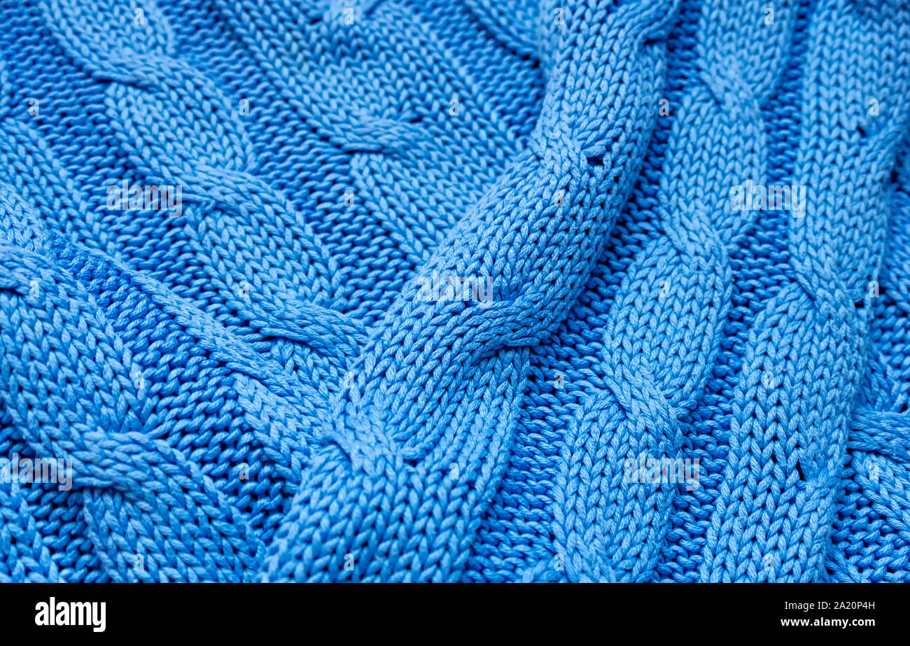 Texture tricoté en bleu. Arrière-plan d'une carte postale. Close up. Banque D'Images