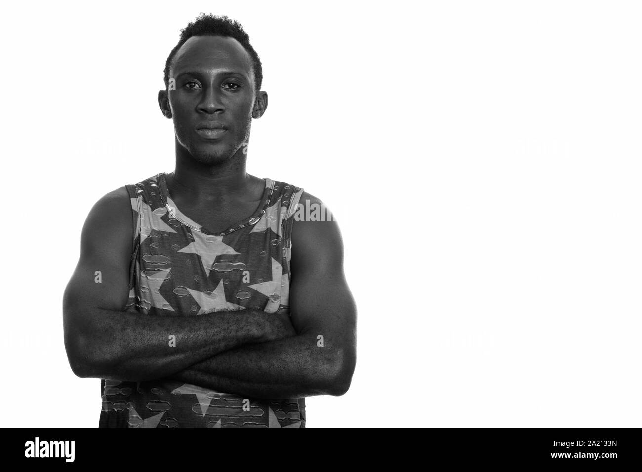 Young black African man with arms crossed Banque D'Images