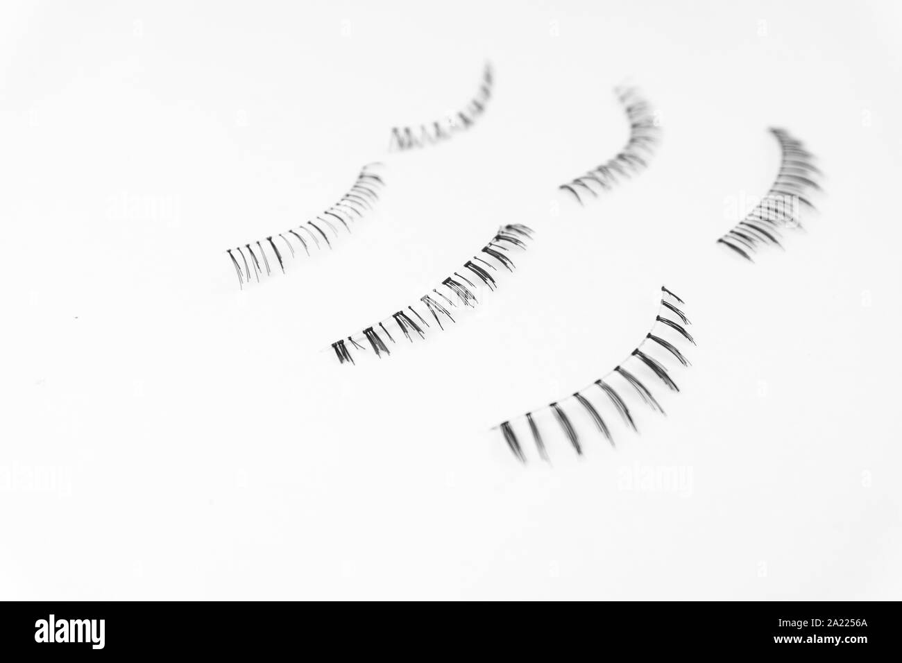 Les yeux faux cils sur fond blanc Banque D'Images