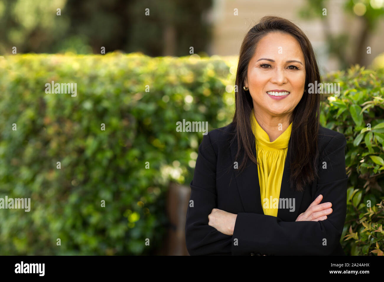 Portrait of a Young Asian woman dans un costume d'affaires. Banque D'Images