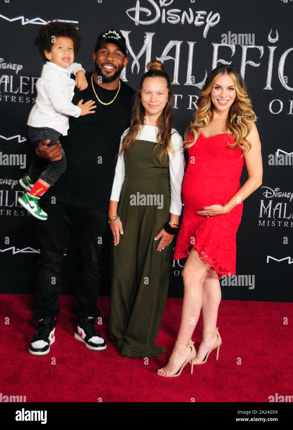 Hollywood, Californie, USA 30 septembre 2019 Maddox Laurel Patron, personnalité de la télévision Stephen 'tWitch' Patron, Weslie Fowler et danseuse Allison Holker assister à la première mondiale du Disney's 'Maleficent : maîtresse du Mal' le 30 septembre 2019 au El Capitan Theatre à Hollywood, Californie, USA. Photo de Barry King/Alamy Live News Banque D'Images